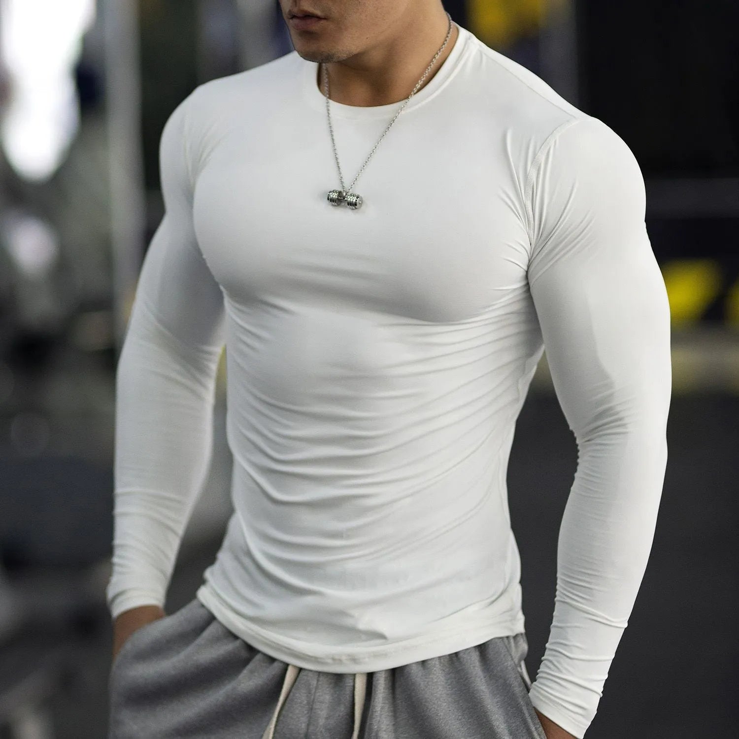 Men's long sleeve fitness tights in black or white solid colour athletic compression wear