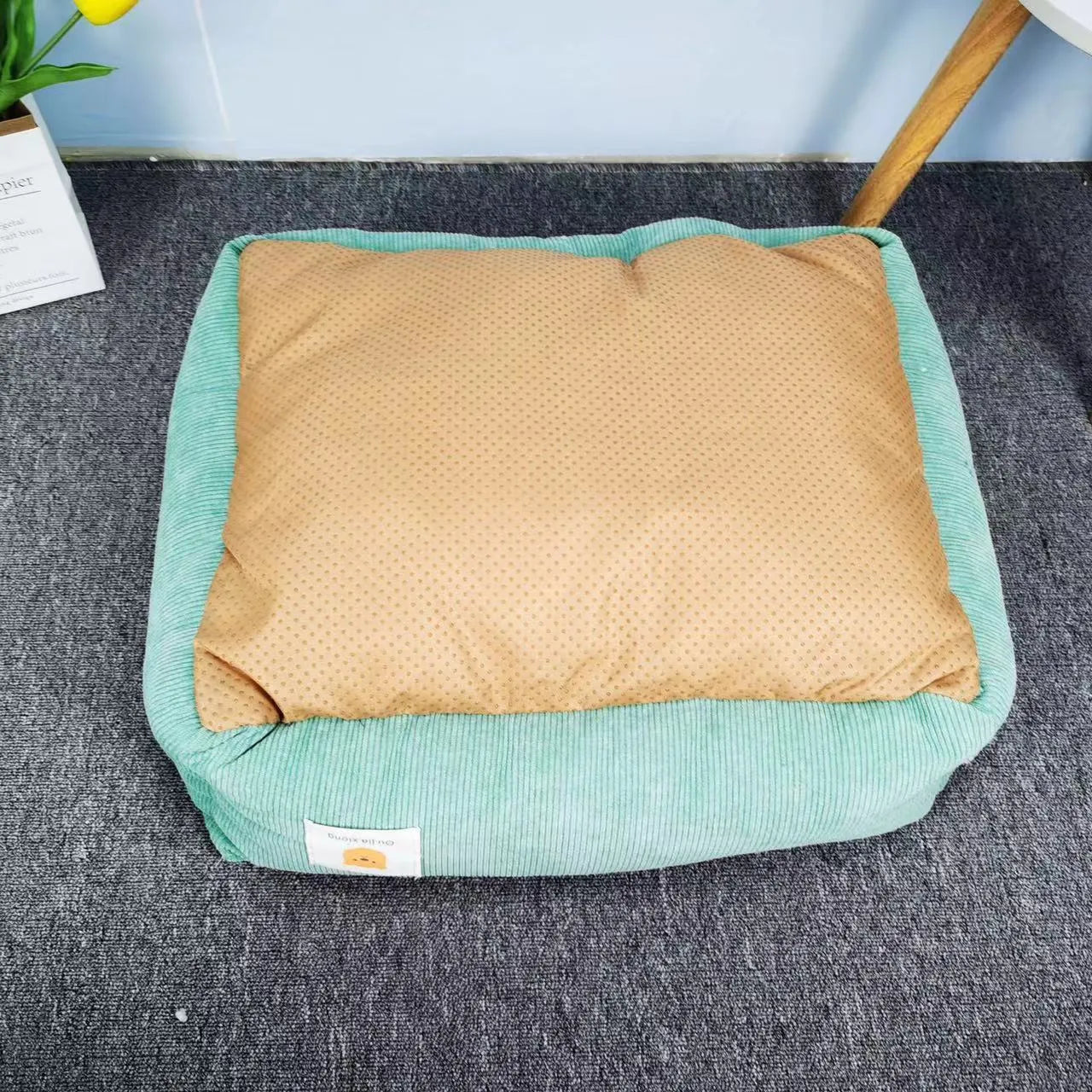 Light blue fine velvet pet nest for dogs and cats with PP cotton filling, shown in 50x40cm size.