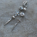 Pair of long geometric pendant earrings with rhinestones in antique silver colour