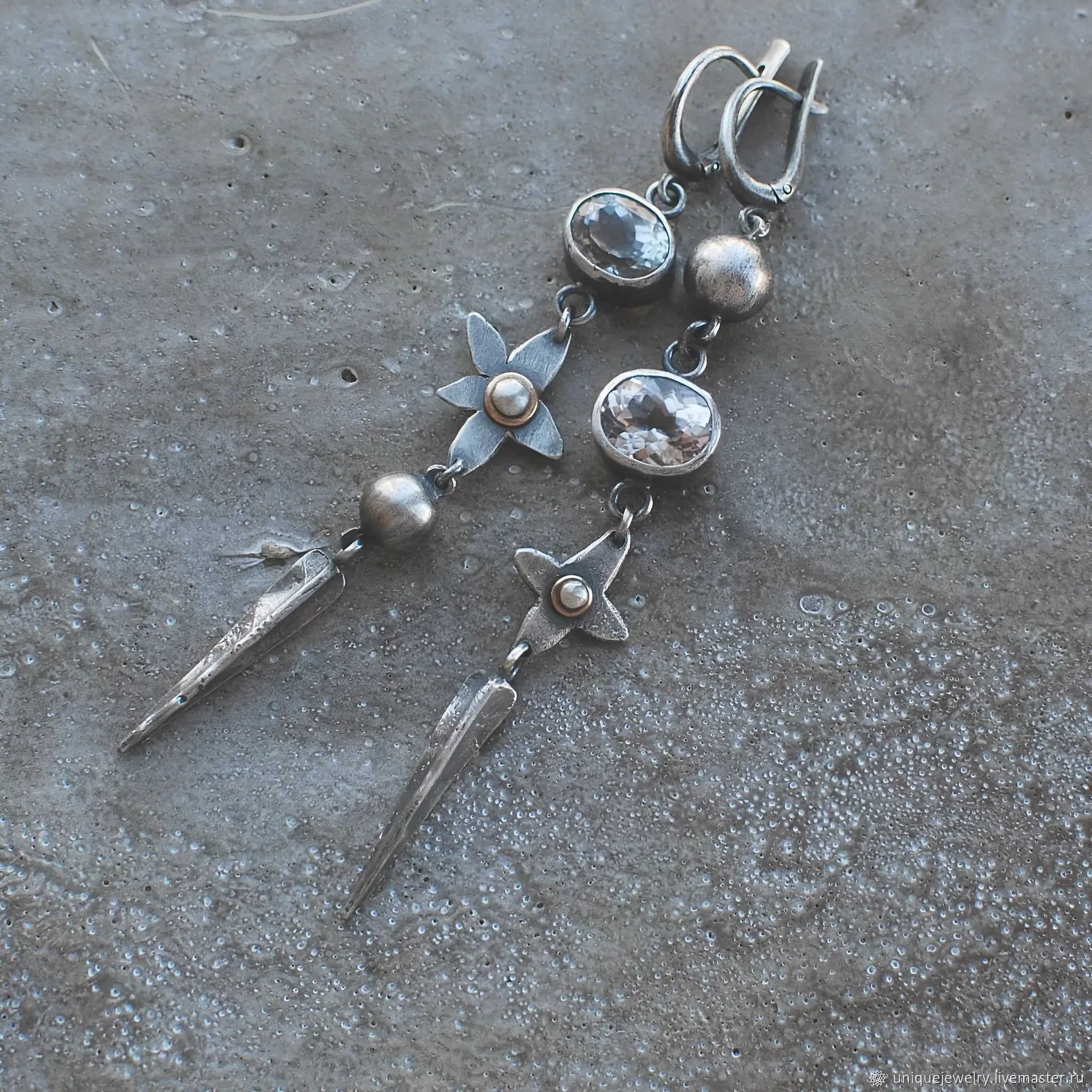 Pair of long geometric pendant earrings with rhinestones in antique silver colour