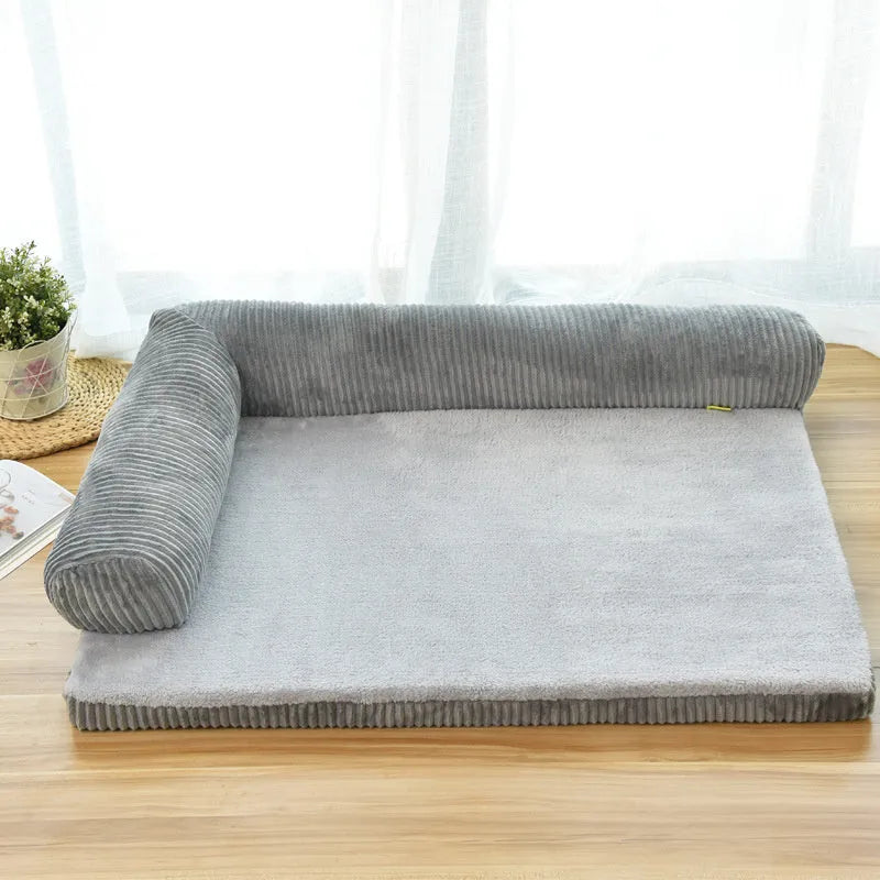 Corduroy pet dog bed sofa in a neutral colour with a raised edge and non-slip base.