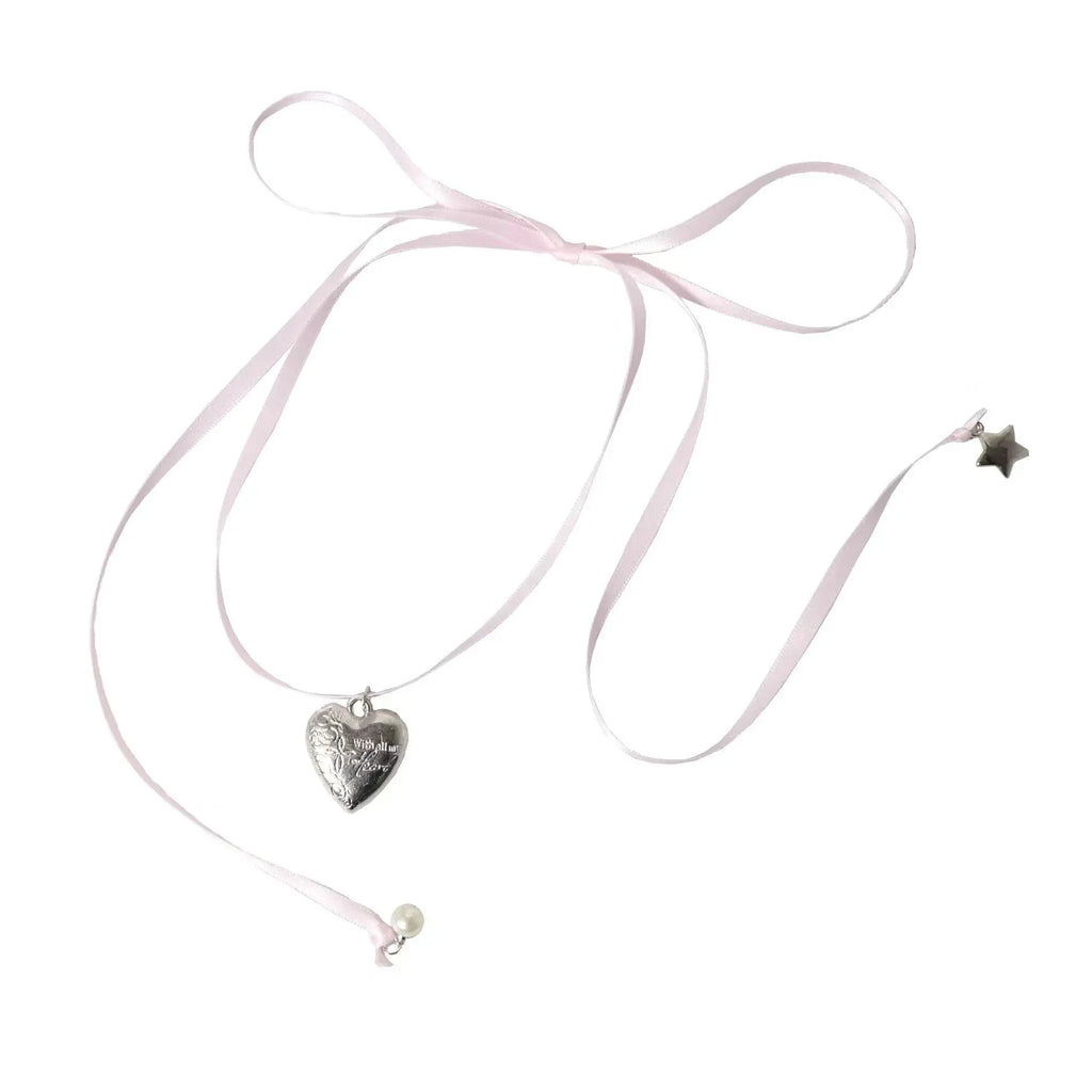 Women's alloy love pendant necklace with ribbon detail on a clavicle chain, electroplated finish.