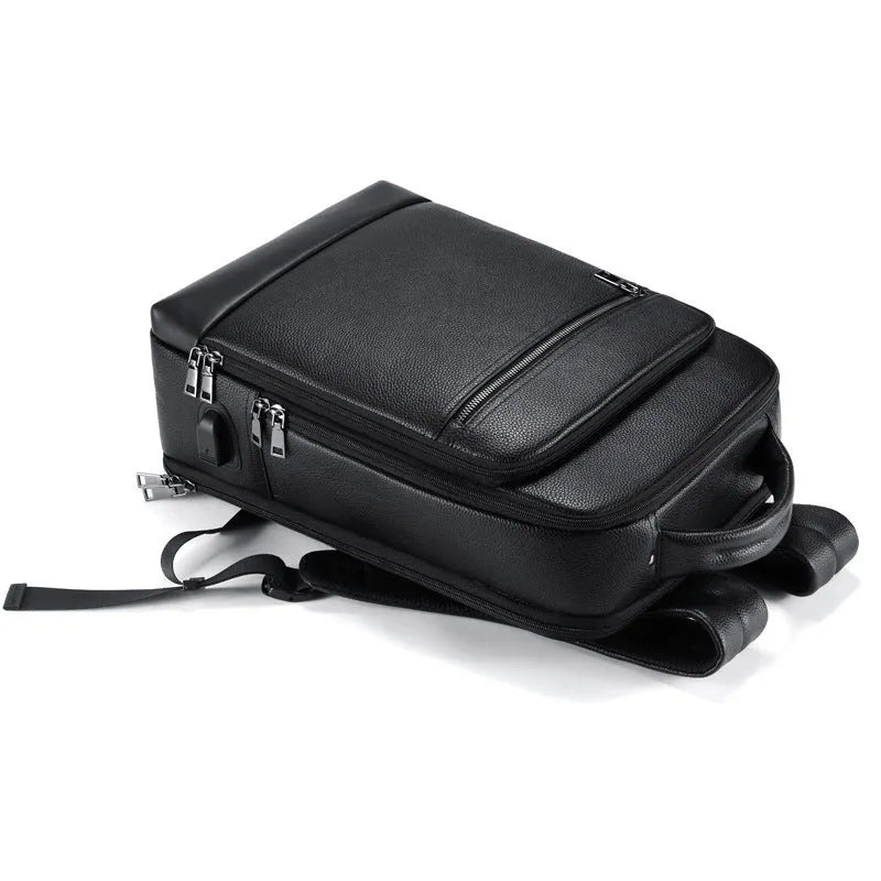 Black leather men's business computer backpack with curved shoulder straps and sewing line details