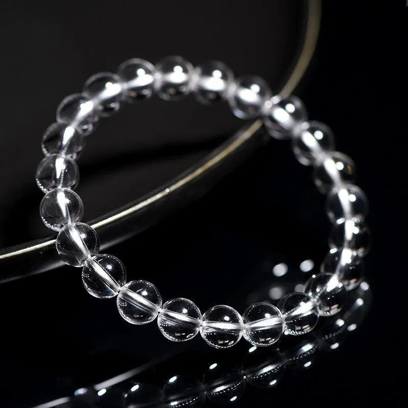 Natural Donghai old mine white crystal geometric bracelet with round beads.