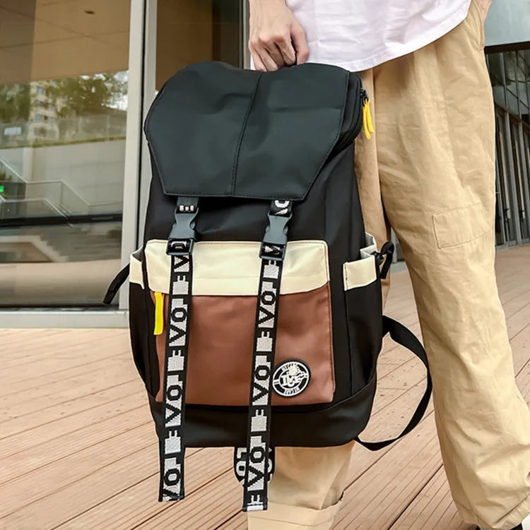 Oxford cloth backpack in black, green, or red with multiple carry handles