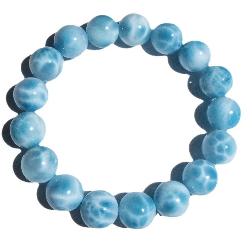 Blue natural crystal sea-pattern bodhi bracelet with pearl accents in Maillard style arrangement