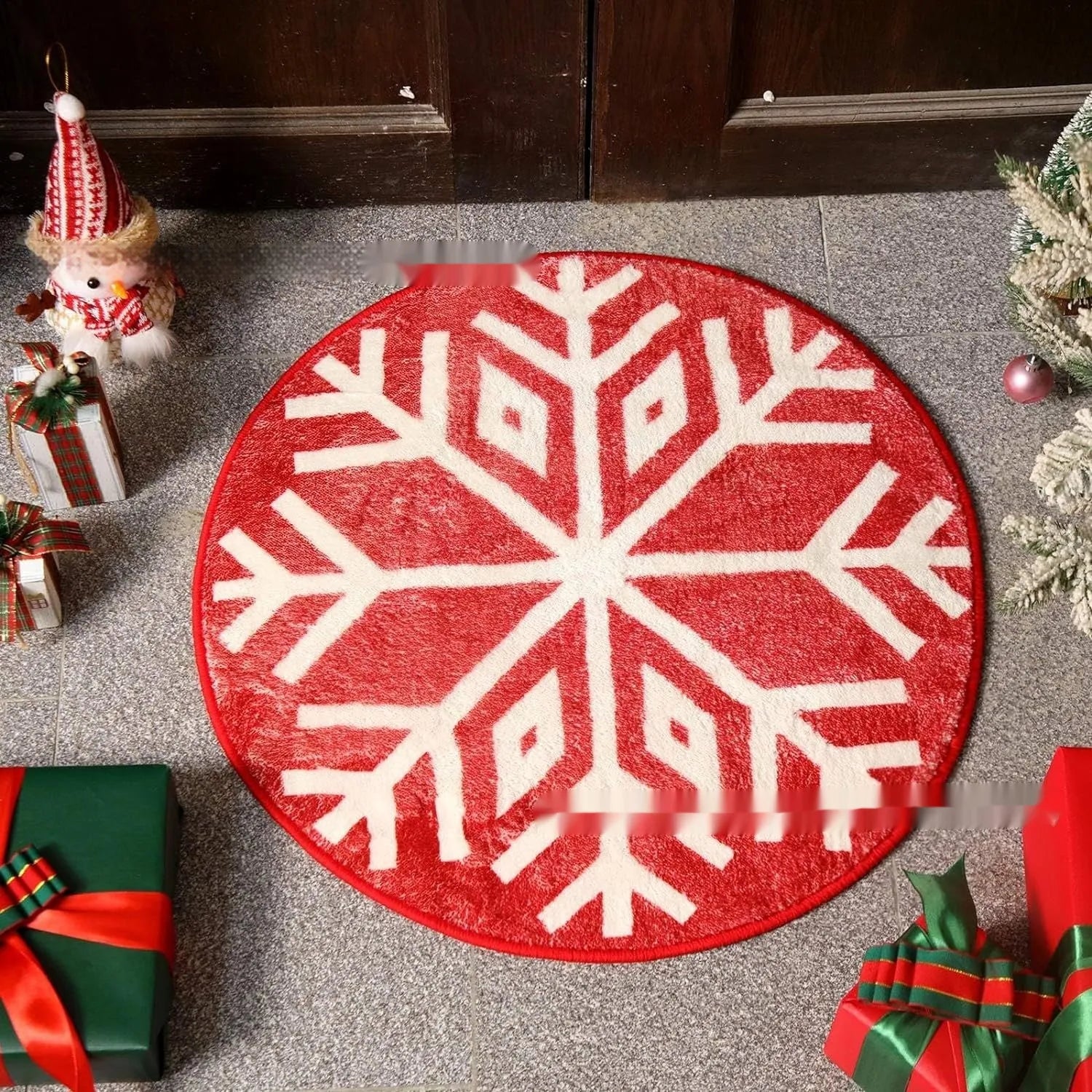 Christmas round pad polyester carpet mat in festive printed design on floor.