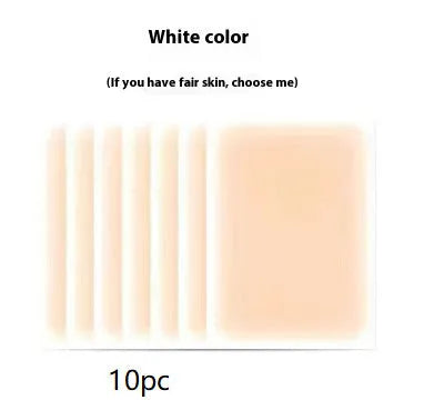 Pack of adhesive tattoo cover patches in various skin tone colours on a white background.