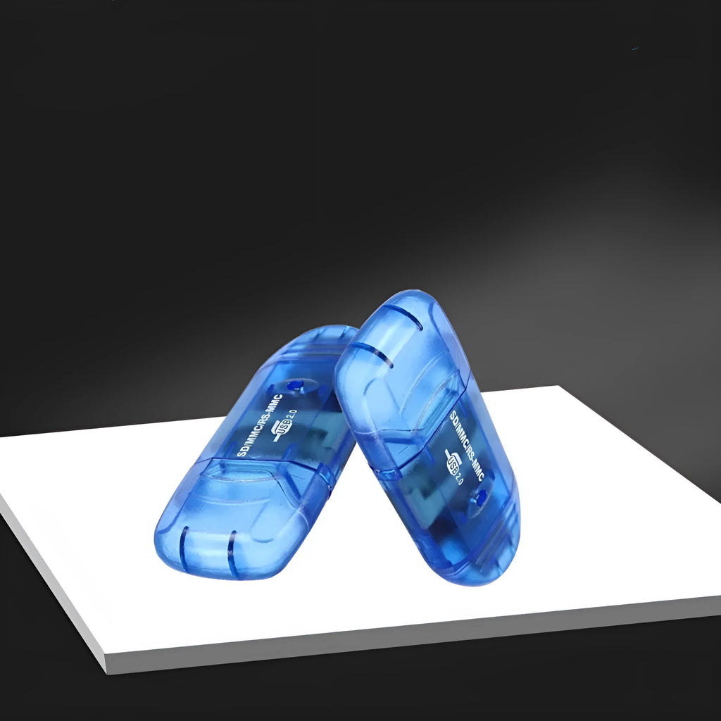 Transparent plastic USB card reader with LED lighting on computer desk