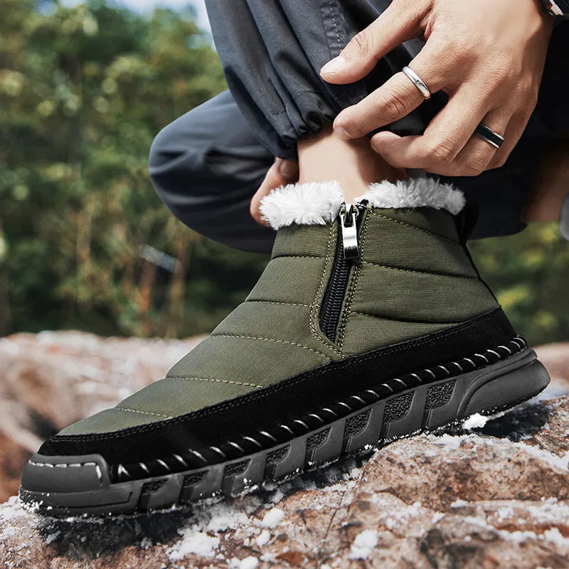 Men's plus size snow boot in blue with round toe and flat heel on a non-slip rubber sole.