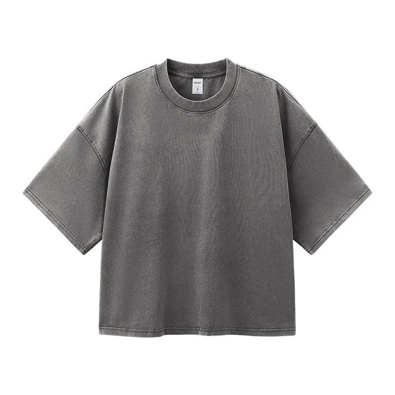 Men's cotton washed-out vintage t-shirt in khaki light showing drop-shoulder sleeve and loose fit