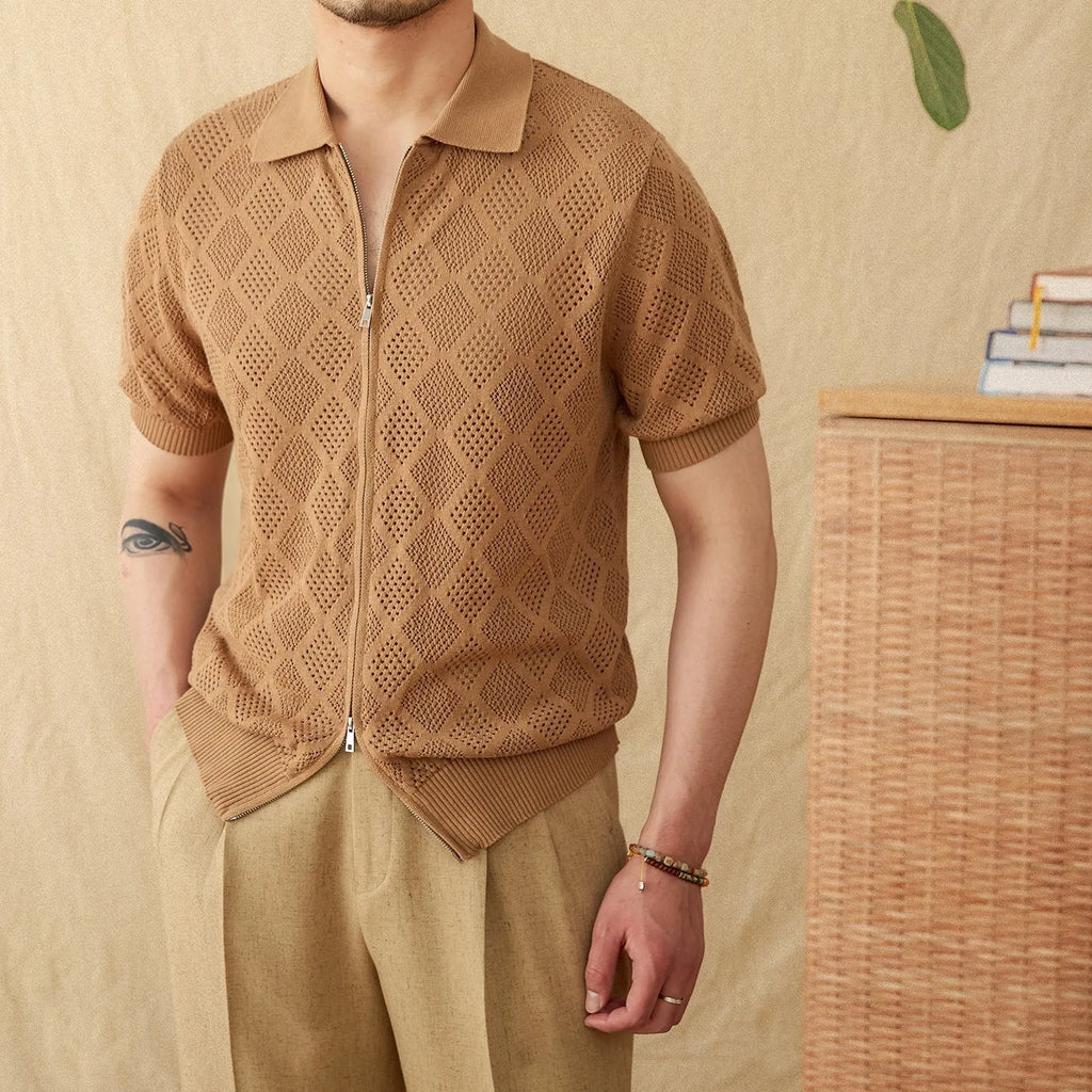 Light brown short sleeve zip-up cardigan with a lapel collar laid flat.