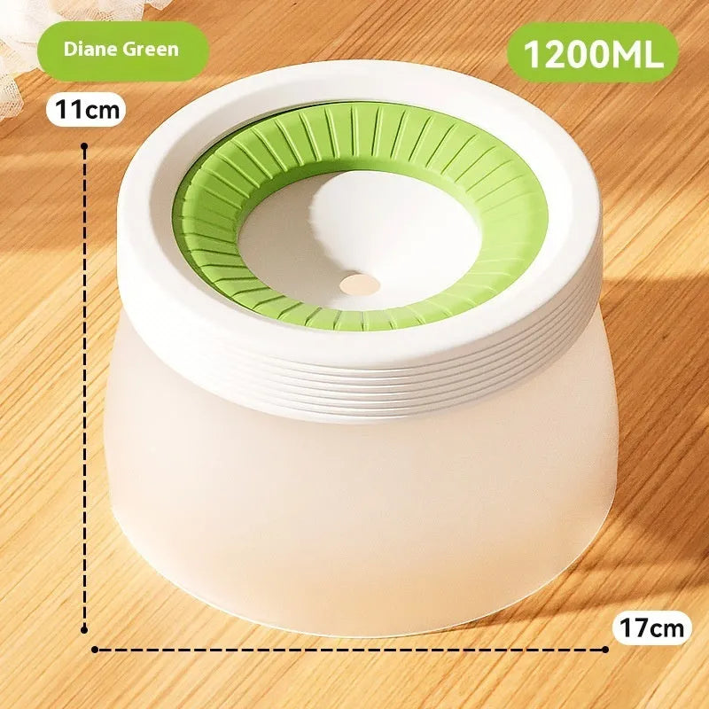 Blue suspended pet water bowl for dogs and cats on a white base plate, showing non-spill design.
