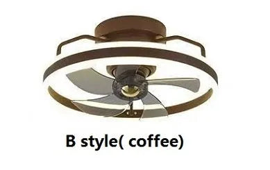 Modern white ceiling fan with integrated light and five PC blades, shown in a bedroom setting.