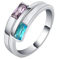 Silver-coloured copper ring with a zircon stone inlay, shown in ins style.