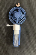 Personalised plastic handheld desk fan with USB port in apricot colour, showing scale.