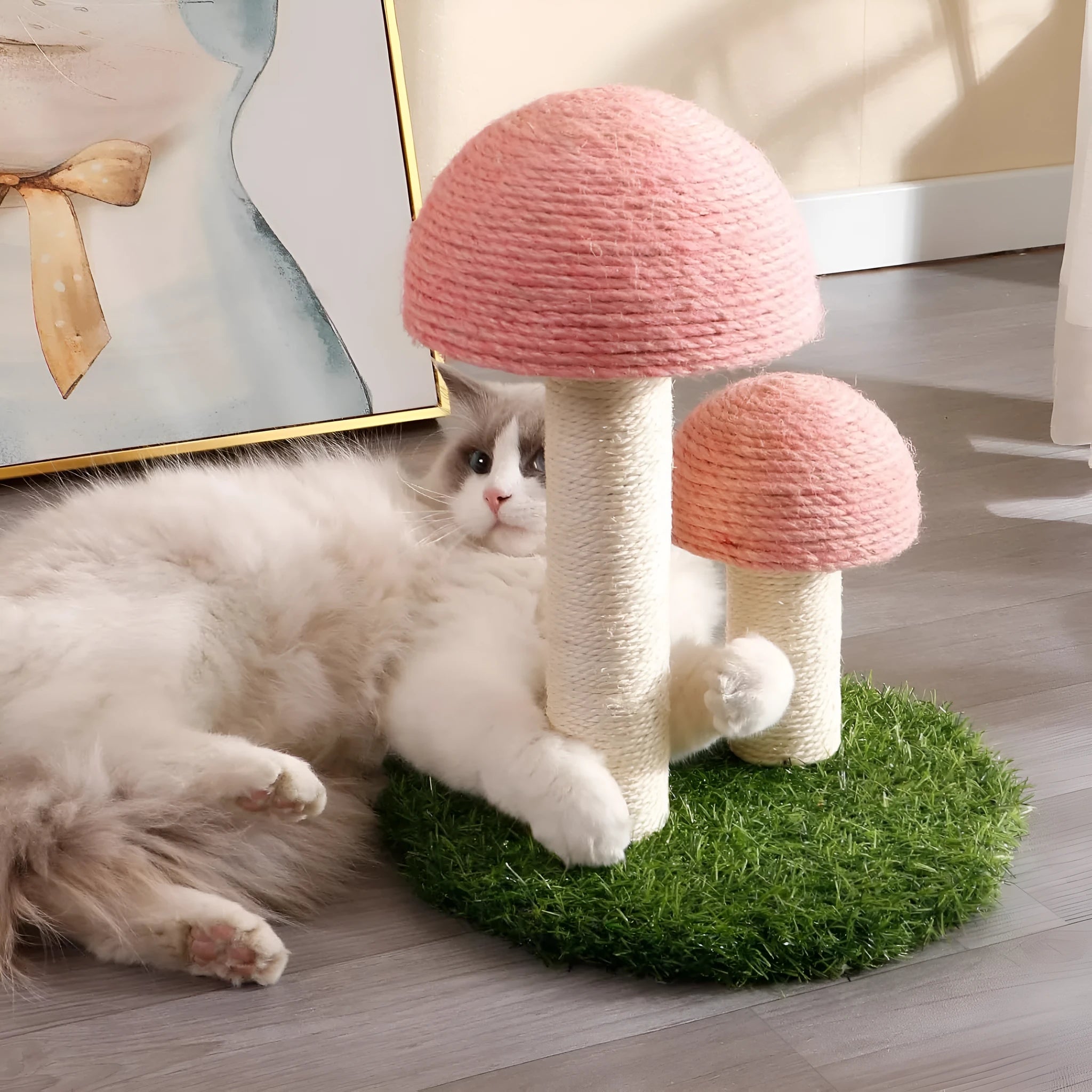 Pink mushroom-shaped cat scratching post with natural sisal scratching surfaces for small cats
