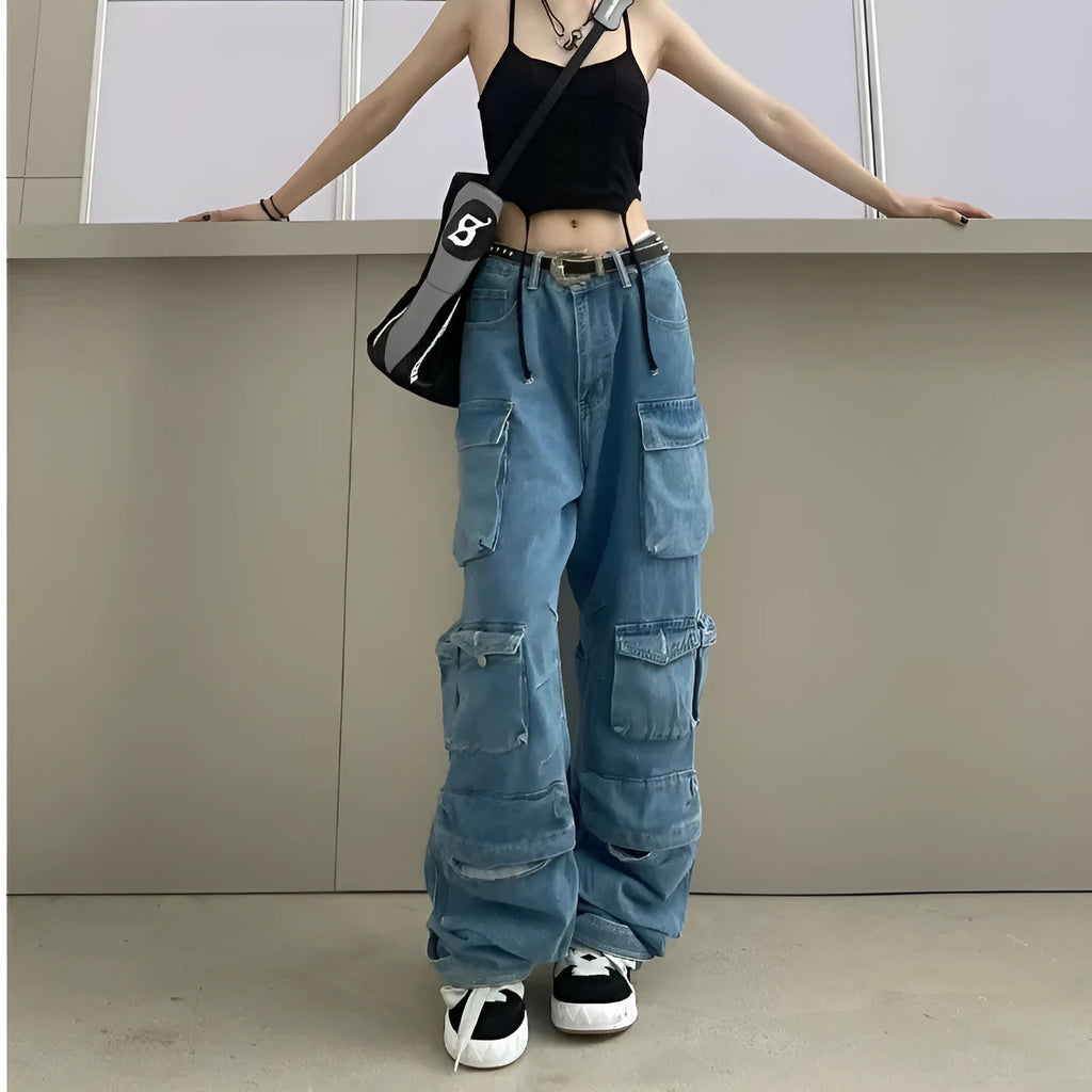 Woman wearing blue tie-dyed high waist wide leg denim trousers with multiple pockets