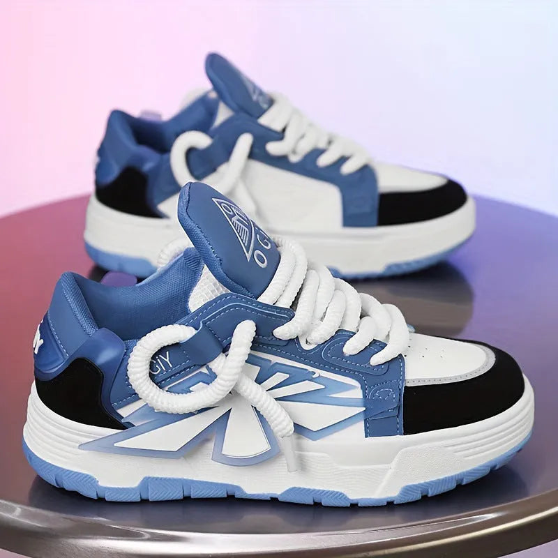 Men's white chunky sneakers with thick rubber sole and totem pattern detail on synthetic leather upper