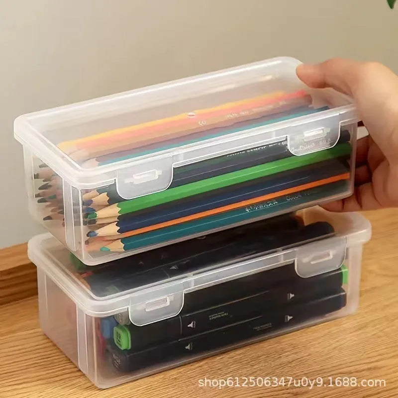 Clear plastic pencil storage box filled with coloured pencils and crayons