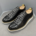 Men's embossed pattern canvas shoes with front tie closure in low tube height design