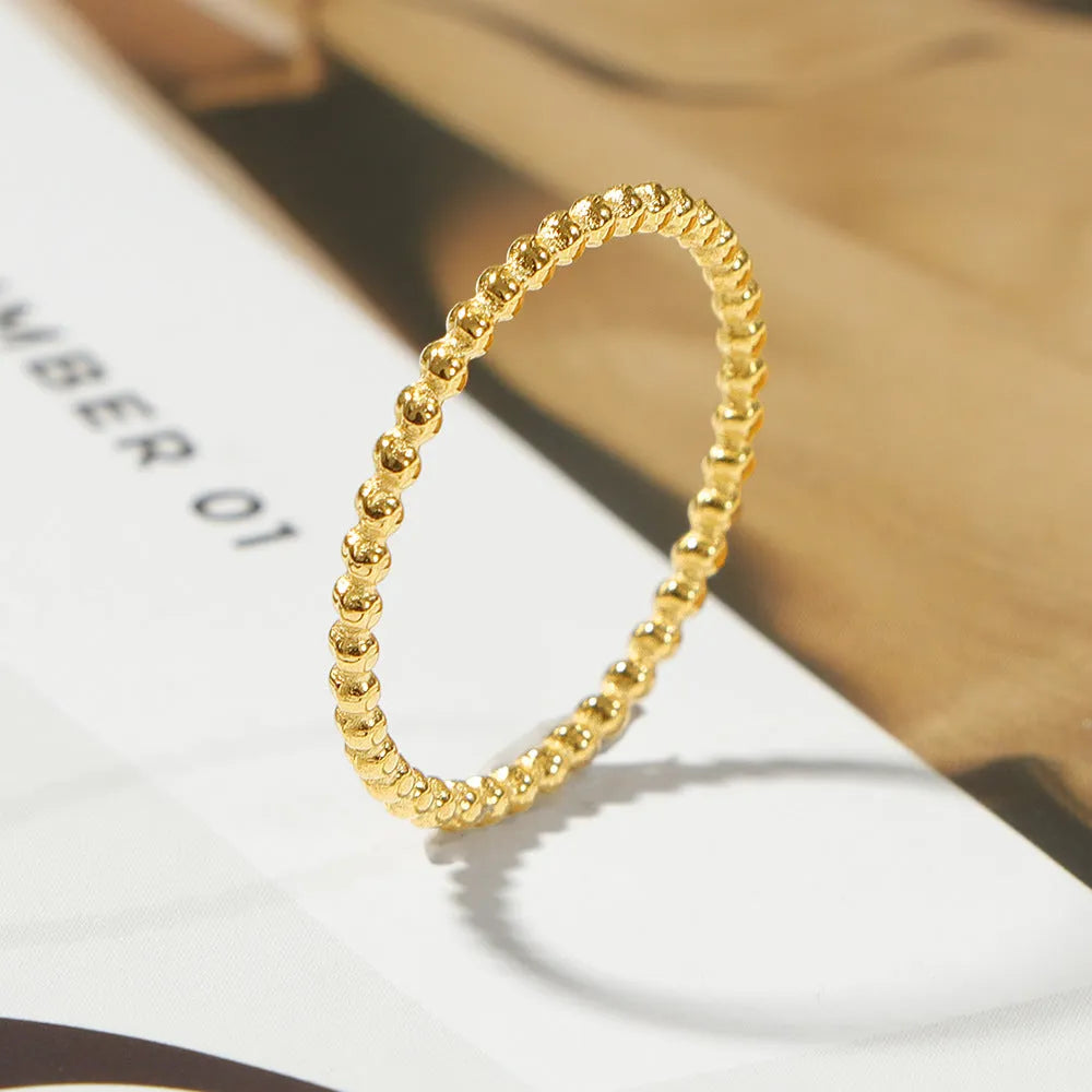 Titanium steel plain circle bead ring in gold colour for women, geometric shape, stackable