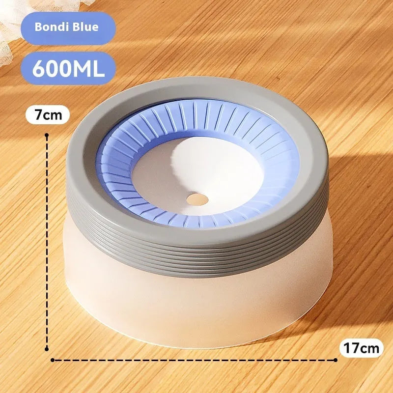 Blue suspended pet water bowl for dogs and cats on a white base plate, showing non-spill design.