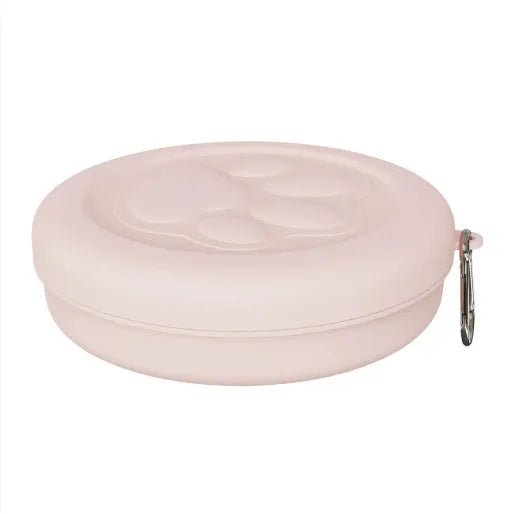 Portable dog feeding bowl with snack compartment lid in light green colour