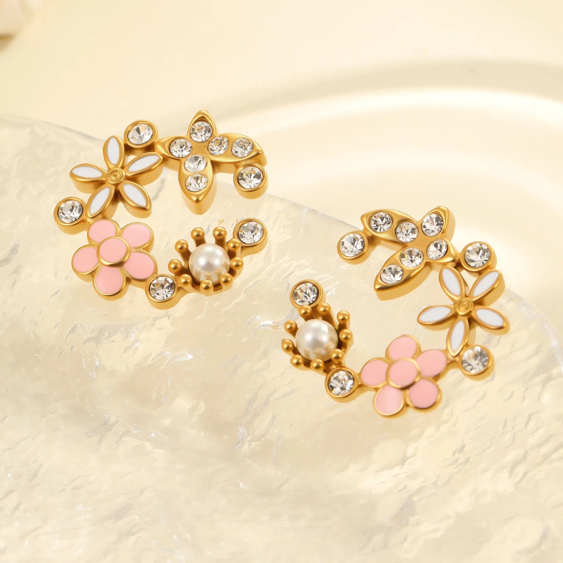 18K stainless steel flower stud earrings with colourful electroplated petals in diamond-shaped arrangement