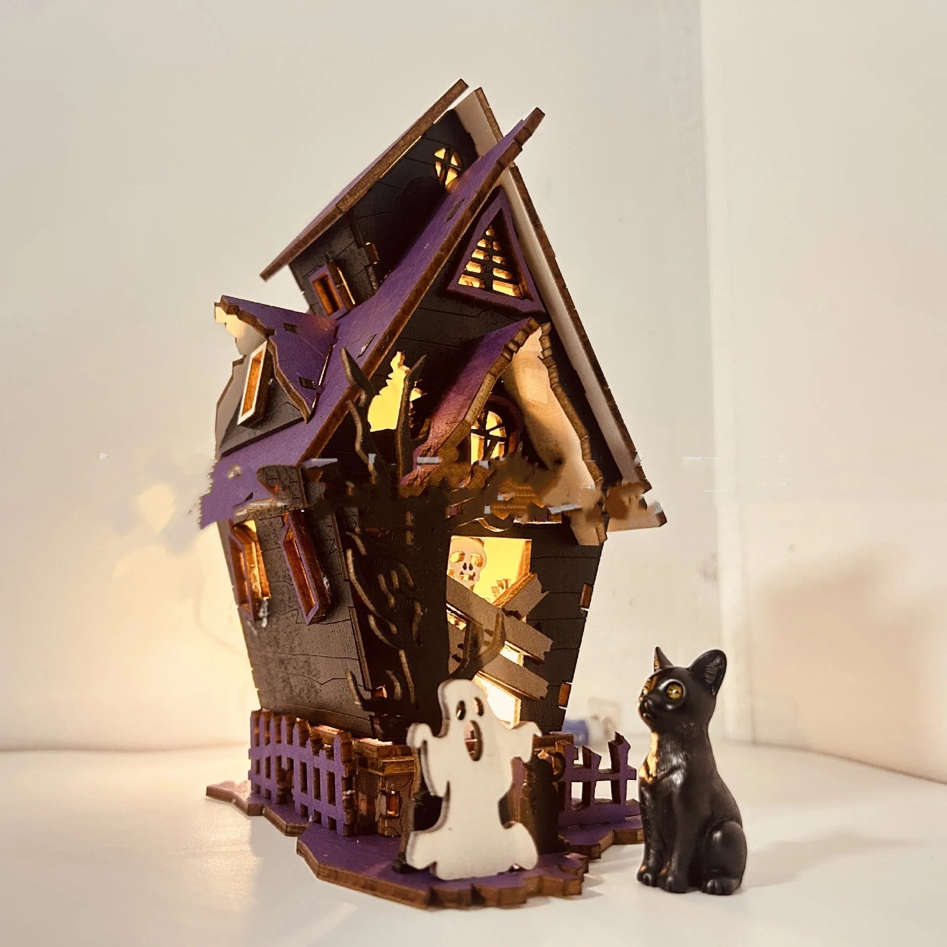 Wooden DIY haunted house decoration kit for Halloween with dimensions 14cm by 10.5cm by 19cm