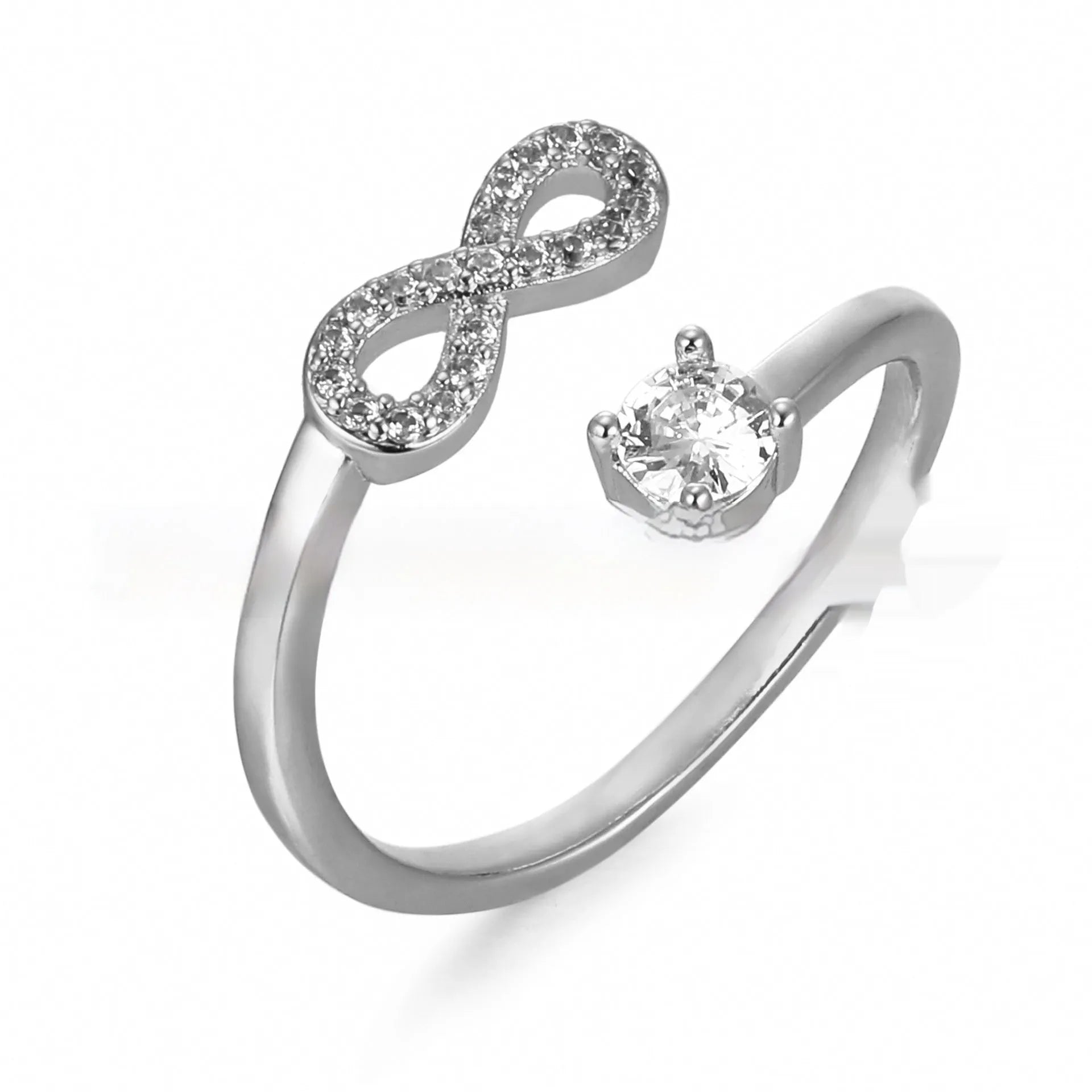Geometric open ring with zircon inlay displaying custom English letter on metal band