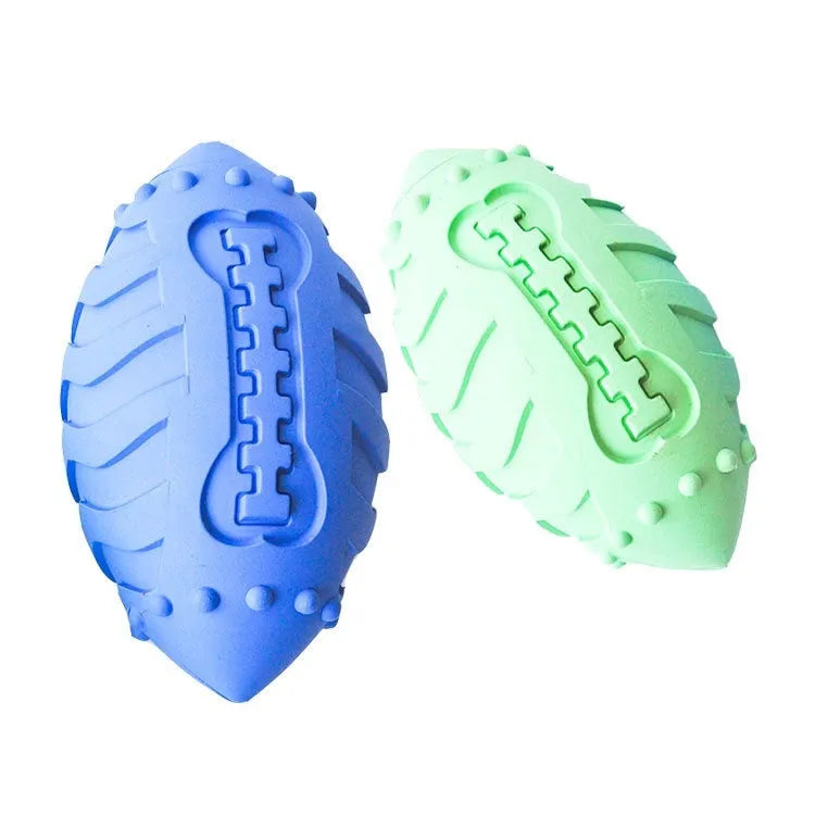 Thickened rubber rugby ball dog toy in light green or sapphire blue for interactive play and teeth cleaning