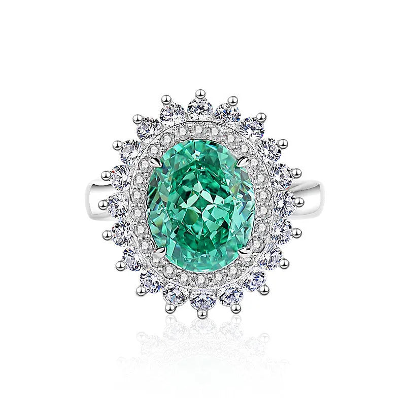 S925 silver emerald ring for women with inlaid high carbon diamonds in a geometric design on a white background.