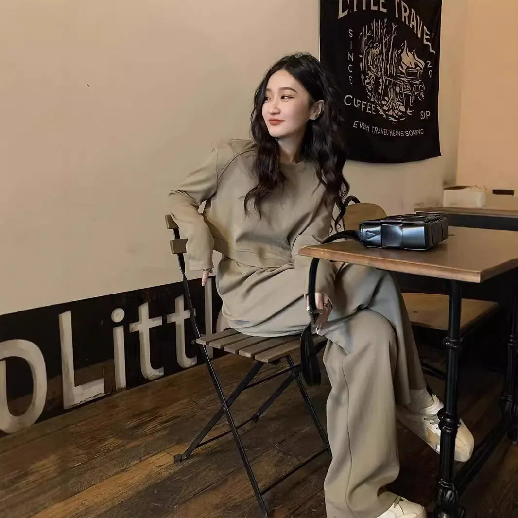 Women's khaki loose casual sports suit set with long sleeve top and trousers in Japanese Korean style.