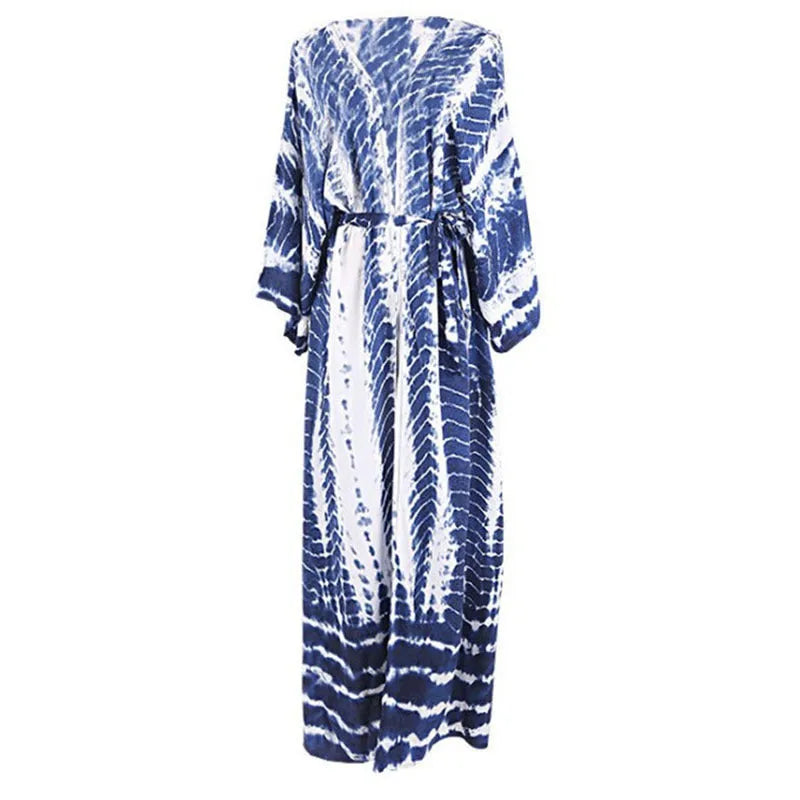 Loose cotton beach cover-up shirt in a printed design on a mannequin