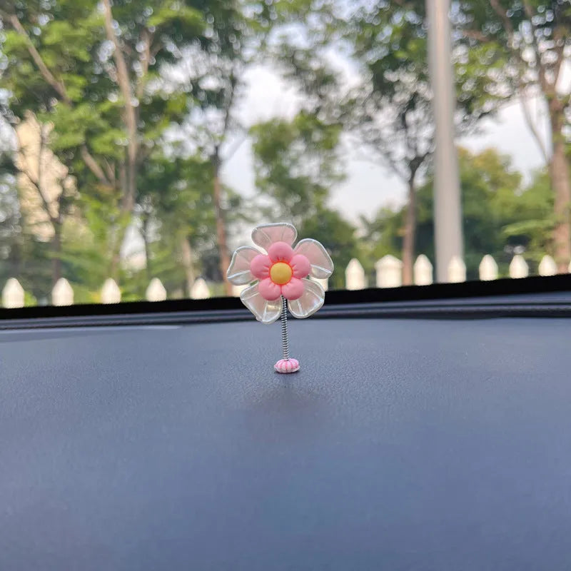 Plastic car swing decoration in choice of five colours measuring 5cm high