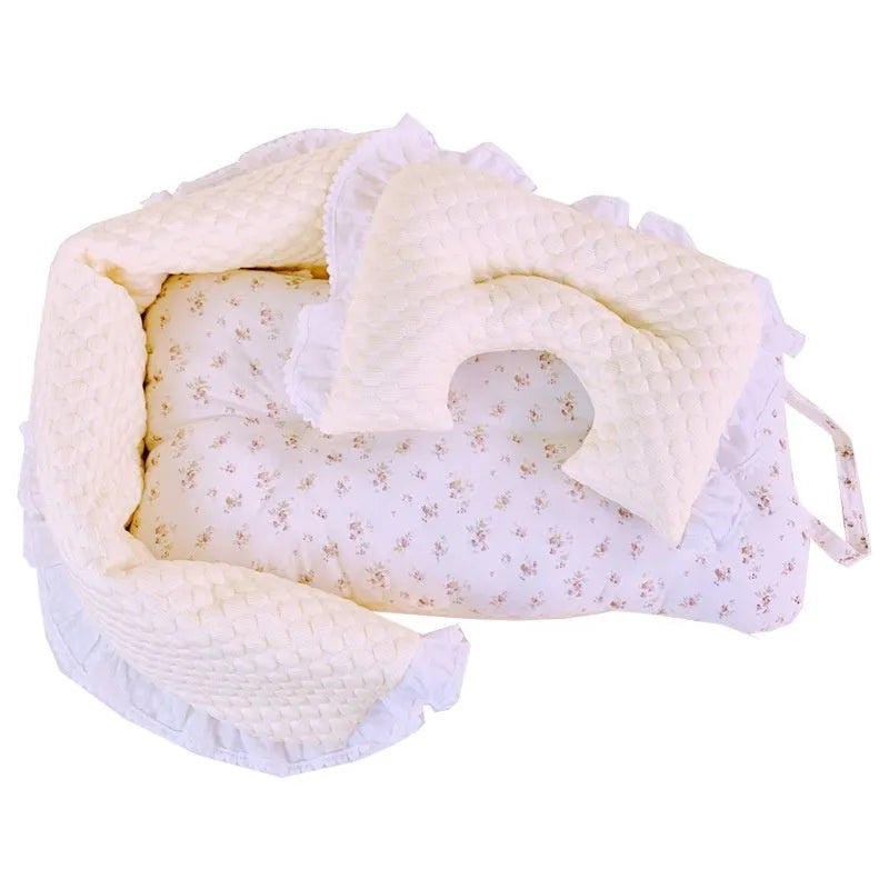 Pet stroller three-piece cushion set with removable cloth towel, pillow and pad in floral pattern.