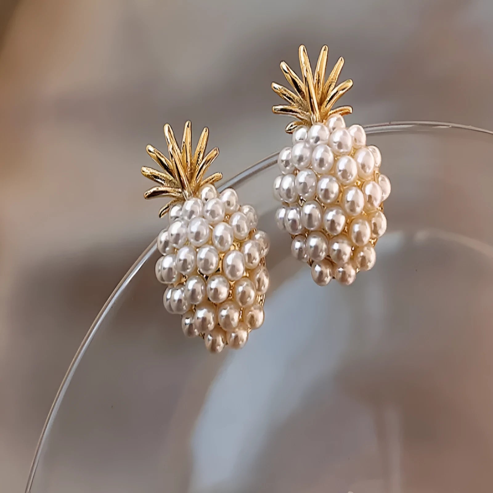 Korean-style pineapple starfish pearl earrings in gold, silver, pearl flower, and starfish pearl electroplated alloy.