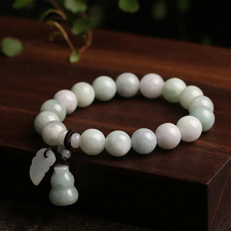 Adjustable natural jade bracelet with geometric pendant and symbolic apple, Maitreya, gourd, and money bag charms.