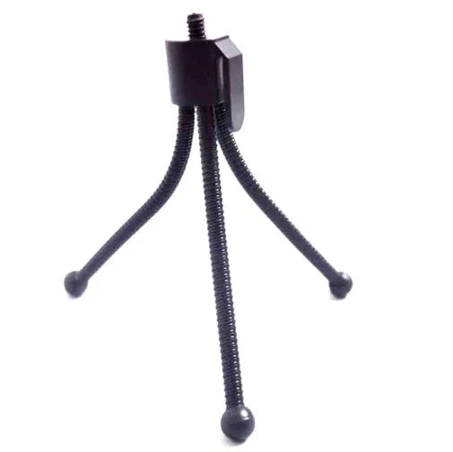 Small silver iron mini tripod with ball head, shown folded next to an iPhone for scale.