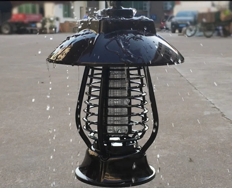 Black solar-powered mosquito lamp with solar panel and LED lights for outdoor insect control