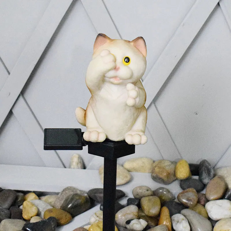 Brown cat-shaped solar-powered lawn light for garden decoration.