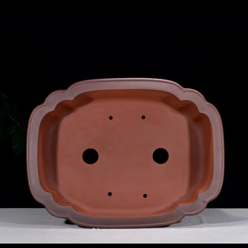 Antique jade Chinese style purple clay flowerpot with golden marble patterning, oval shape, 71cm long.
