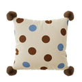 Blue cartoon animal print square sofa cushion with removable pillowcase on a grey sofa.