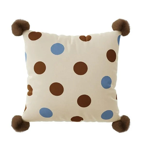 Blue cartoon animal print square sofa cushion with removable pillowcase on a grey sofa.
