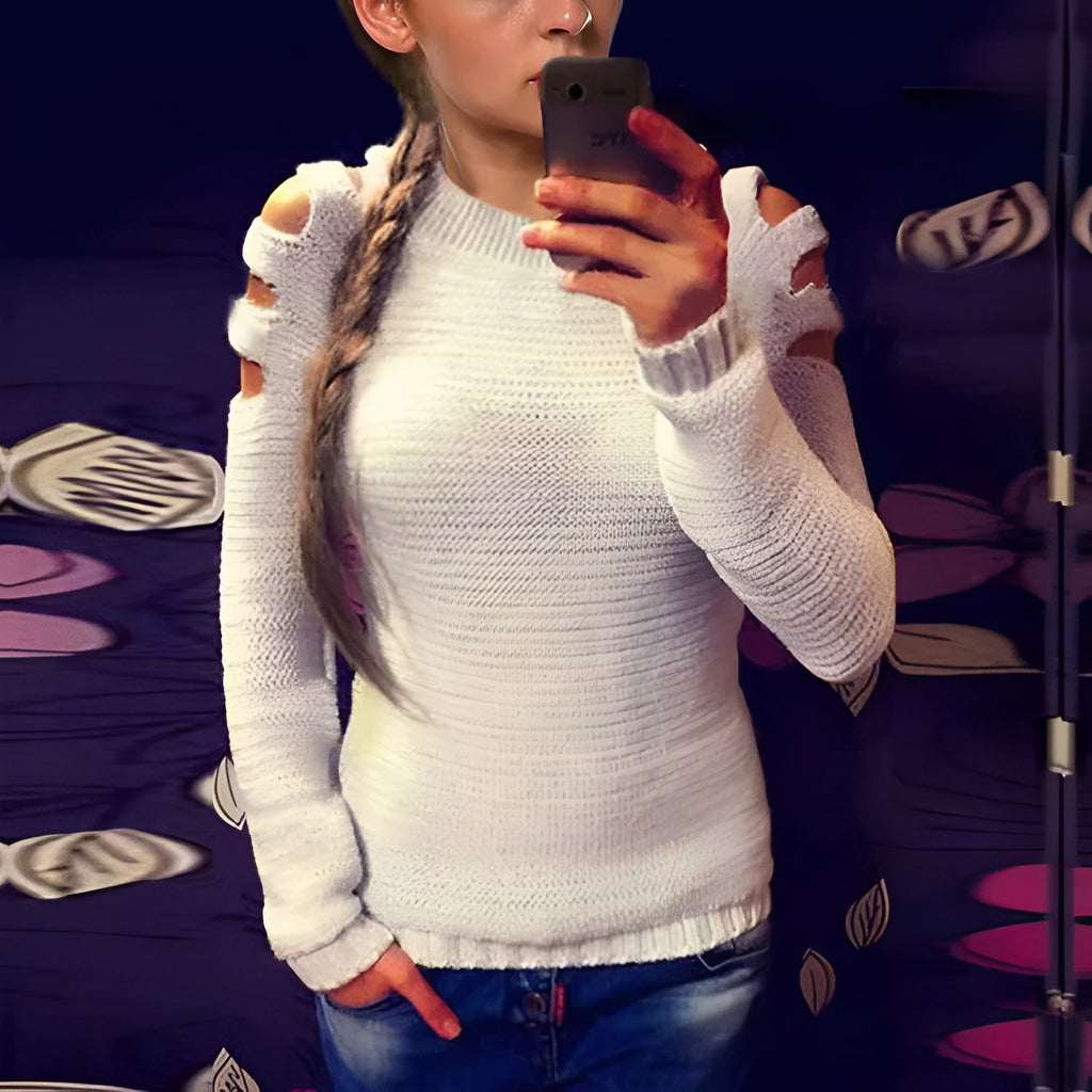 Women's white knitted pullover shirt with a crocheted hollow-out pattern and round neck.