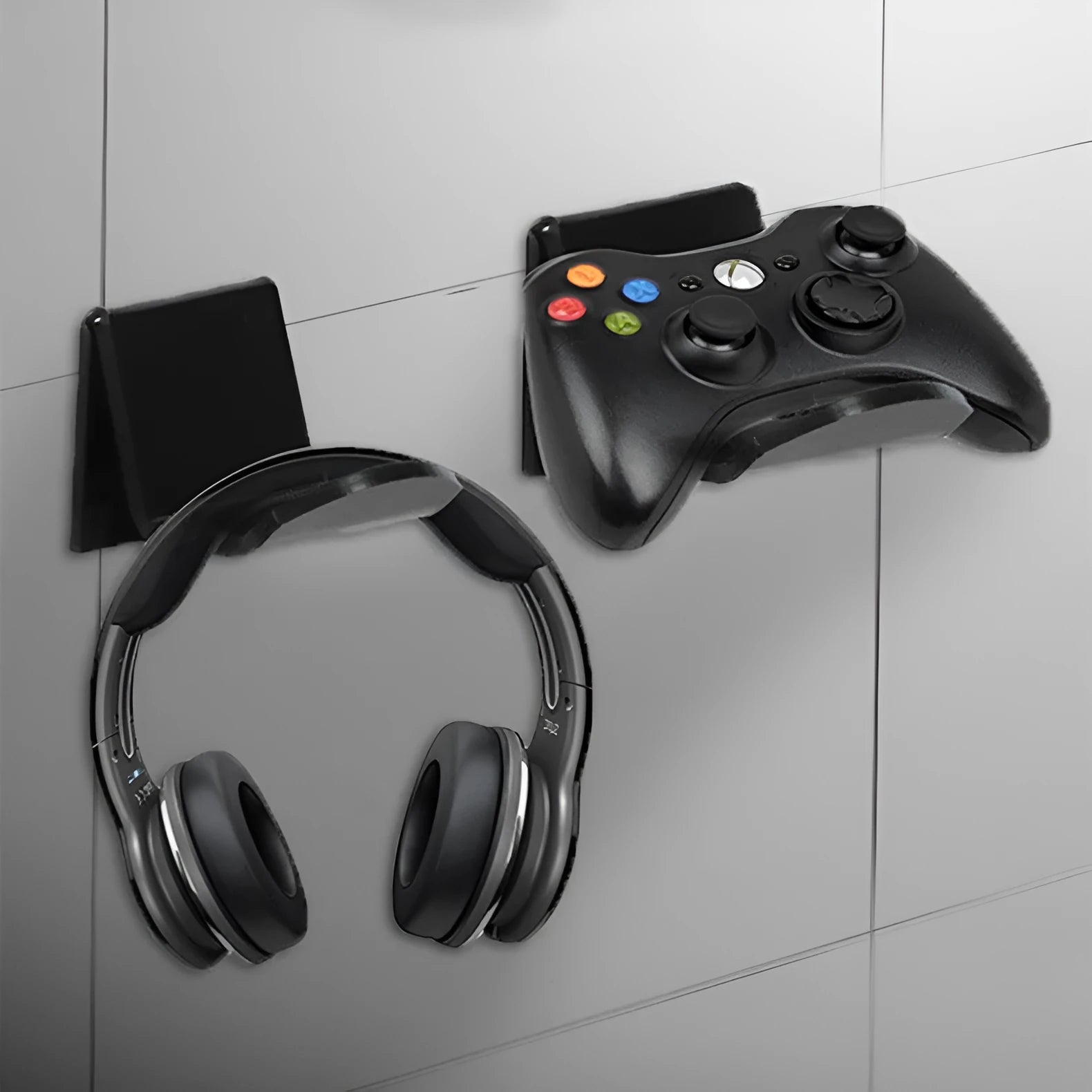 Universal game controller mounting bracket in black, white and transparent colours