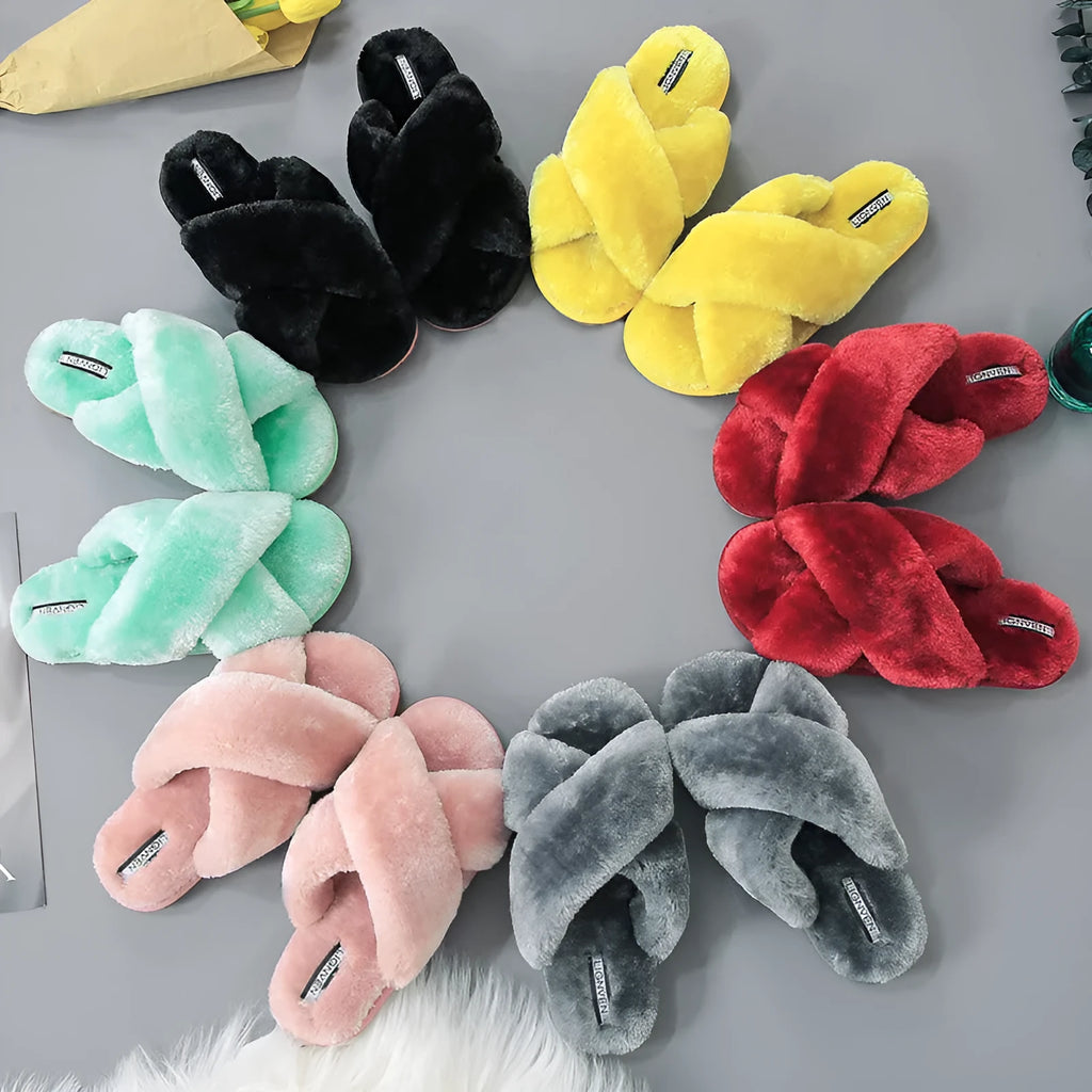 Cross open-toe fur slippers in various colours on a non-slip patterned rubber sole.