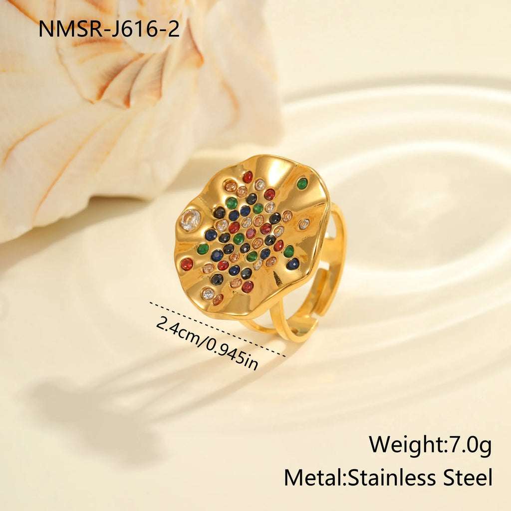 Geometric pleated titanium steel ring with colourful crystals and adjustable open mouth design