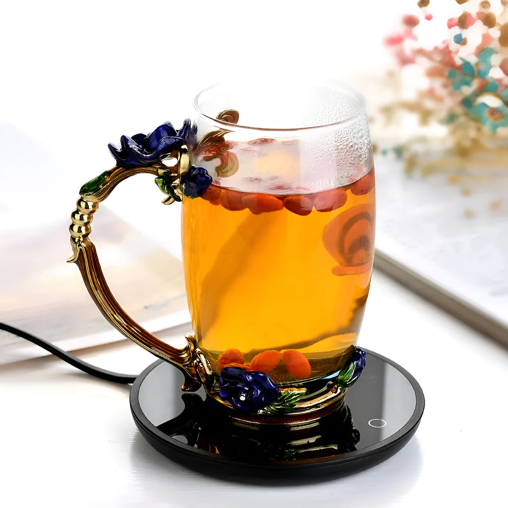 Black coffee mug warmer on desk showing 12cm diameter and low/high temperature switch
